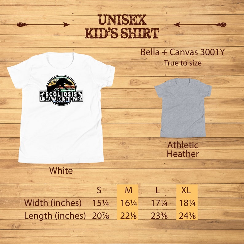 May include: White unisex kid's t-shirt with a graphic of a dinosaur and the text "Scoliosis Like A Walk In The Park". The shirt is available in sizes S, M, L, and XL. The size chart shows the width and length of the shirt in inches.