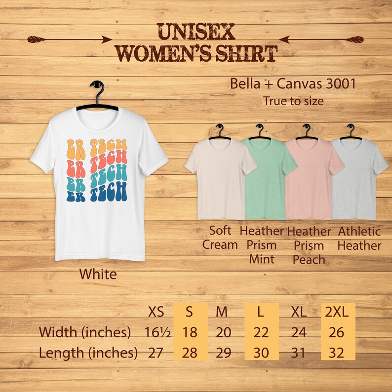 Op de afbeelding: Een wit unisex T-shirt met een kleurrijk "ER TECH" grafisch ontwerp. Het shirt is verkrijgbaar in maten XS tot 2XL en is gemaakt door Bella + Canvas 3001. De maattabel toont de breedte en lengte in inches.