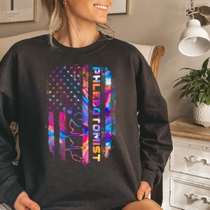 Phlebotomist shirt, long sleeve, sweatshirt, tank top, hoodie, gift, US flag, July 4th, Phlebotomy, blood bank, medical laboratory