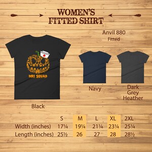May include: Black fitted shirt with a pumpkin design composed of Halloween-themed icons and the text "MRI SQUAD". The shirt also comes in navy and dark grey heather. Measurements are provided in inches.