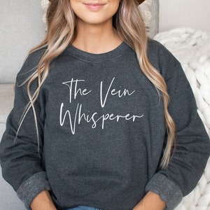 The vein whisperer shirt, hoodie, sweatshirt, tank top, gift, phlebotomist, phlebotomy, nurse