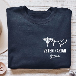 Personalized Veterinarian shirt, long sleeve, sweatshirt, gift, pocket custom name veterinary receptionist, vet tech, technician, vet school