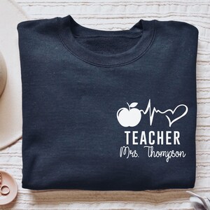 Personalized Teacher shirt, long sleeve, sweatshirt, tank top, hoodie, gift, pocket custom name heartbeat school teacher, high school