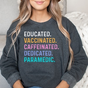 Paramedic shirt, hoodie, sweatshirt, tank top, gift, educated vaccinated, EMS, EMT, first responder, ambulance, essential