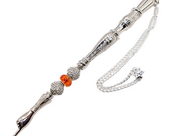 May include: A silver yad with a chain and a Star of David charm. The yad has a hand pointing upwards and is decorated with beads, including two orange beads.