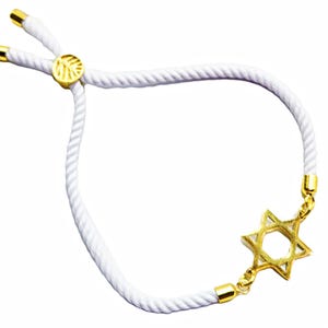 May include: White rope bracelet featuring a gold-colored Star of David charm. The adjustable bracelet has gold-colored metal accents and a circular charm with a leaf design. A stylish and meaningful piece of jewelry.