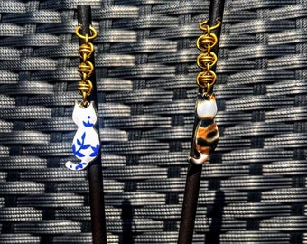 Palito de cabelo com pingente de gato