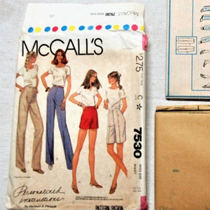 May include: Vintage McCall's sewing pattern packet featuring illustrations of pants and shorts. The packet includes the pattern, instructions, and a diagram of the garment. The pattern number is 7530.