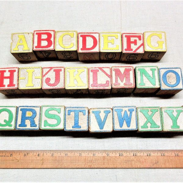 Vintage lot of wooden letter blocks, each has another letter on the opposite side. in good used condition.