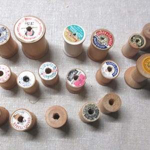 Vintage wood thread spools, all empty. Lot of 17. Different makers, different eras.