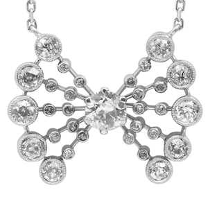Antique Diamond Platinum Bow Pendant