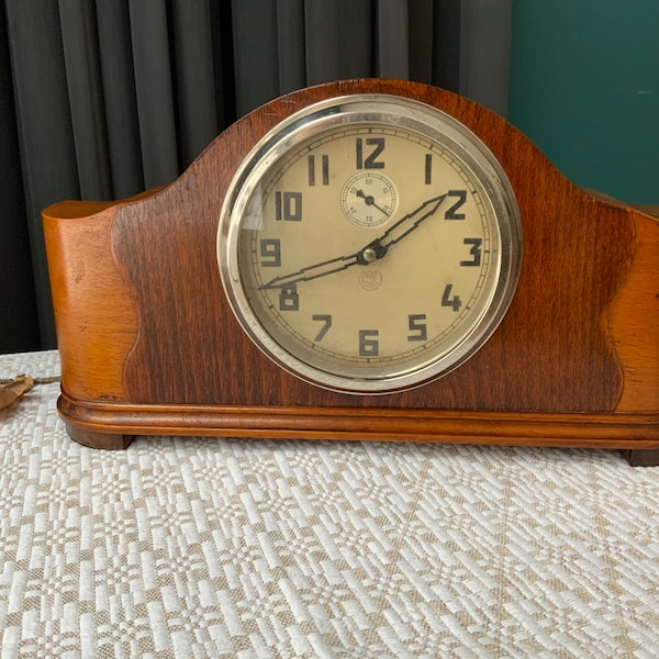 Wooden desk clock. Vintage mantel clock USSR 1950s. Mechanical watch. Old clock with key. Retro style Vladimir plant clock.