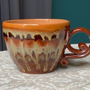 Vintage Latvian Clay Mug: Rustic Brown Ceramic Tankard