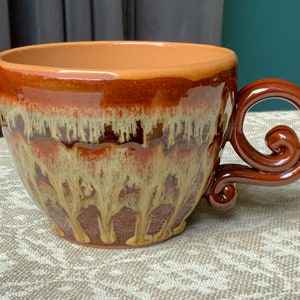 Vintage Latvian Clay Mug: Rustic Brown Ceramic Tankard