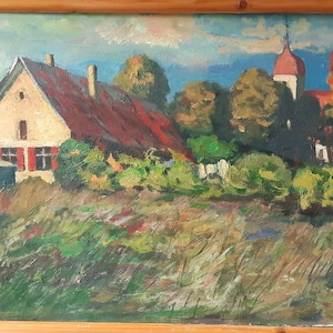 May include: Oil painting of a rural landscape with a house, trees, and a church. The house has a red roof and red shutters. The painting is in a wooden frame and features a vibrant color palette of greens, browns, and blues.