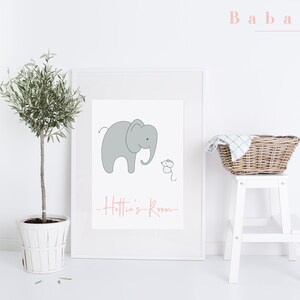 May include: A white framed print with a gray elephant and a small mouse illustration. The text "Hattie's Room" is written in pink below the illustration.