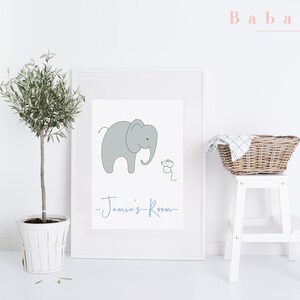 May include: A white framed print with a gray elephant and a small mouse illustration. The text "Jamie's Room" is written in blue cursive below the illustration.