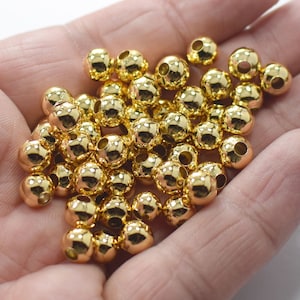 7 mm, 24K Shiny Gold Plated Round Ball Beads - Hole 3 mm
