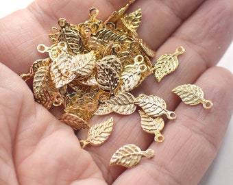 7 X 13 Mm , 24K Shiny Gold Plated Tiny Leaf Charms - NF0041