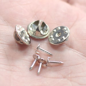 Silver Tone  Rosette - Silver  Rosette - 11.5 mm x 5 mm Tag - 8 mm nail length