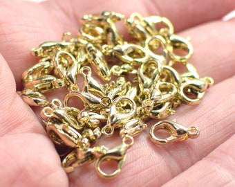 5.5 x 10 mm , broches de langosta tono oro - 1