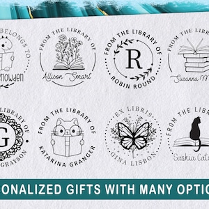 May include: Eight different designs for personalized bookplate stamps. Each stamp features a different design, including a dinosaur, flowers, a cat, a butterfly, and an initial. The text on the stamps reads "From the Library of" and includes the name of the owner.