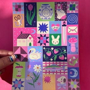May include: A rectangular art print featuring a grid of colorful illustrations including a tulip, a house, a swan, a rabbit, a mushroom, a fish, strawberries, flowers, a heart with the word LOVE, a dagger, and various geometric quilt patterns.