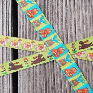 Ruban tissé, Rubans Renaissance, 3 motifs différents - lapins, éléphants, citrouille et corbeau avec chat