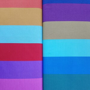 Può includere: Due campioni di tessuto con strisce orizzontali in vari colori. Il campione a sinistra ha strisce di corallo, marrone, azzurro, rosso, viola, rosa, fucsia e rosso. Il campione a destra ha strisce di blu scuro, viola, marrone, azzurro, blu, turchese, viola, fucsia e blu scuro.