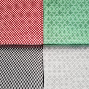 Könnte beinhalten: Vier Stoffmuster: Rot mit weißen Punkten, Grün mit floralem Muster, Schwarz mit weißen Punkten und Grau mit floralem Muster. Die Stoffe sind gefaltet und zusammen ausgestellt.