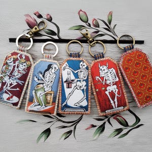 Patches by Alex* - Keyring "Skulls (Alexander Henry)" 8.2 x 4.5 cm ; Tag Shape