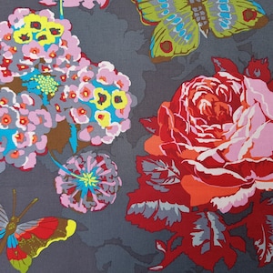 May include: A gray fabric with a floral pattern featuring pink, red, orange, yellow, blue, and green flowers. The fabric also has a butterfly design.