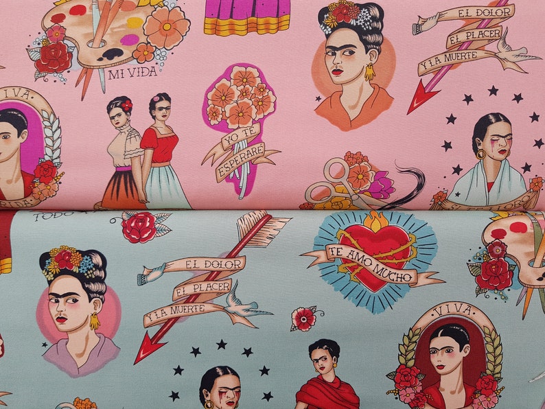 May include: Pink and teal fabric featuring illustrations of Frida Kahlo with floral elements, hearts, and text in Spanish. The design includes portraits, arrows, and the words "MI VIDA" and "TE AMO MUCHO".