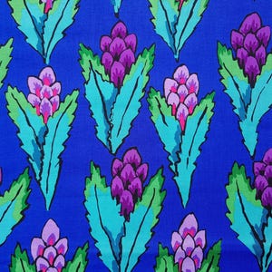 May include: A colourful fabric with a repeating floral design. The pattern features stylised purple flower clusters with pink accents, set against large, turquoise leaves. The background is a deep blue.