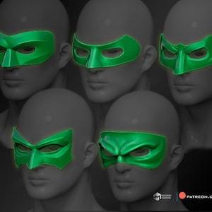 May include: Five green eye masks with different designs are shown on mannequin heads. The masks have a glossy finish and are set against a dark background. The designs vary, offering a range of styles.