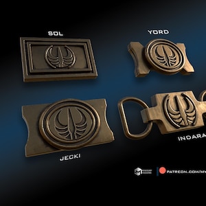 May include: Four different metal belt buckles with a stylized symbol of a winged spear. The buckles are labeled "Sol", "Yord", "Indara", and "Jecki".