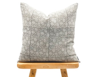 gray floral pillow