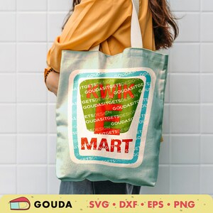 May include: A blue and green tote bag with a red and white logo that says "Kwik Mart" in a retro font. The logo is surrounded by the words "Goudasitgetsdesign" in a green font.