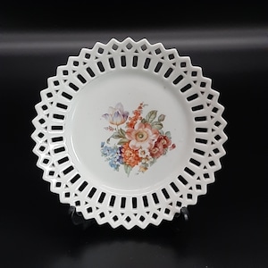 Decorative plate with floral motif, openwork edge around 1900