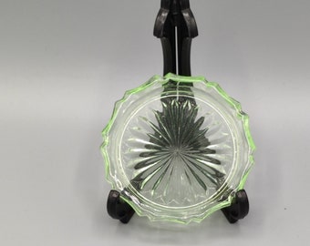 Coaster pressed glass green around 1920.