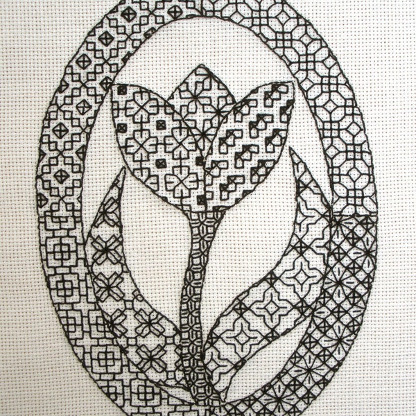 Blackwork pattern, stylised tulip, oval frame, traditional style, Jacobean or Tudor, stitch diagrams, photographs, stitched gift, to make