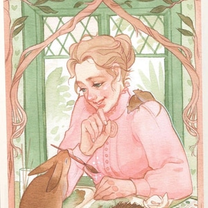 May include: A framed illustration of Beatrix Potter, the author of children's books, sitting at a table with a rabbit and a hedgehog. She is holding a paintbrush and appears to be working on a painting. The illustration is in a light pink and green color scheme and has a vintage aesthetic.