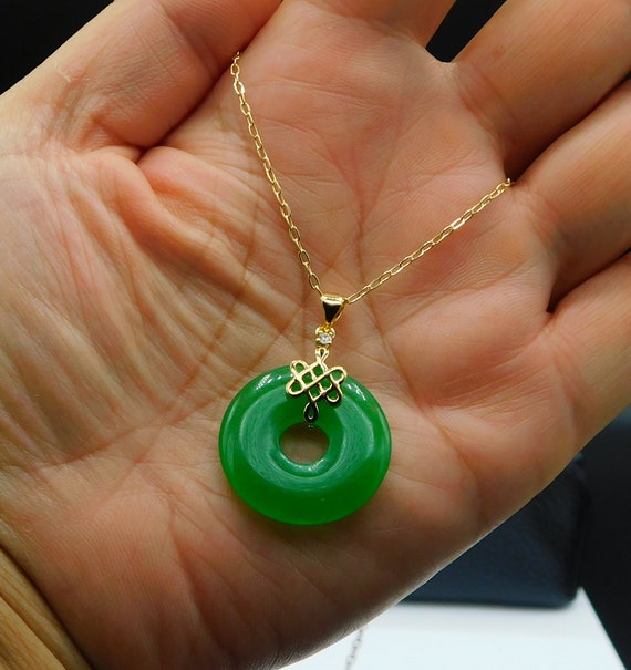 Jade shop disk pendant