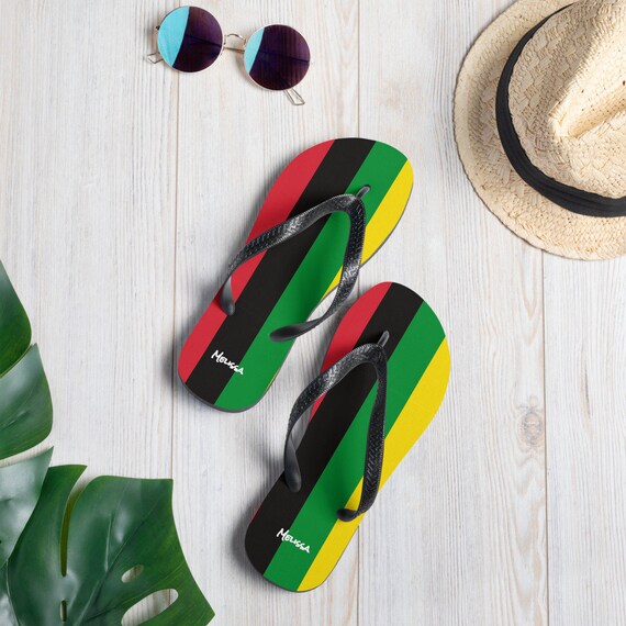 Rasta flip flops sales