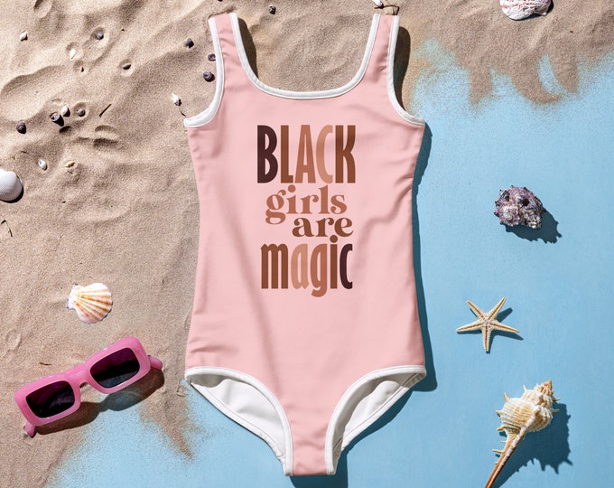 Featured listing image: Black Girls Are Magic Kids Swimsuit, Black Girl Magic, Gift for kids, Gift for daughtergift for toddler, Girls swimwear, Pink Swimsuit