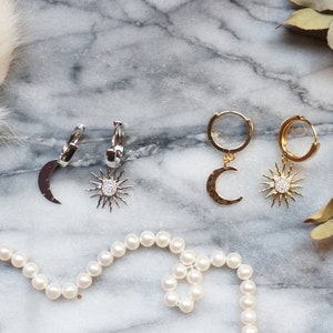 Urban outfitters sun store and moon earrings