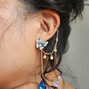 Maeve Faerie blue butterfly cuff earrings with blue iridescent crystal / Fairy earrings