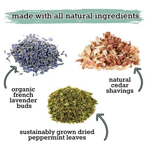 May include: A close-up of three piles of dried herbs and wood shavings. The piles are labeled "organic french lavender buds", "sustainably grown dried peppermint leaves", and "natural cedar shavings".
