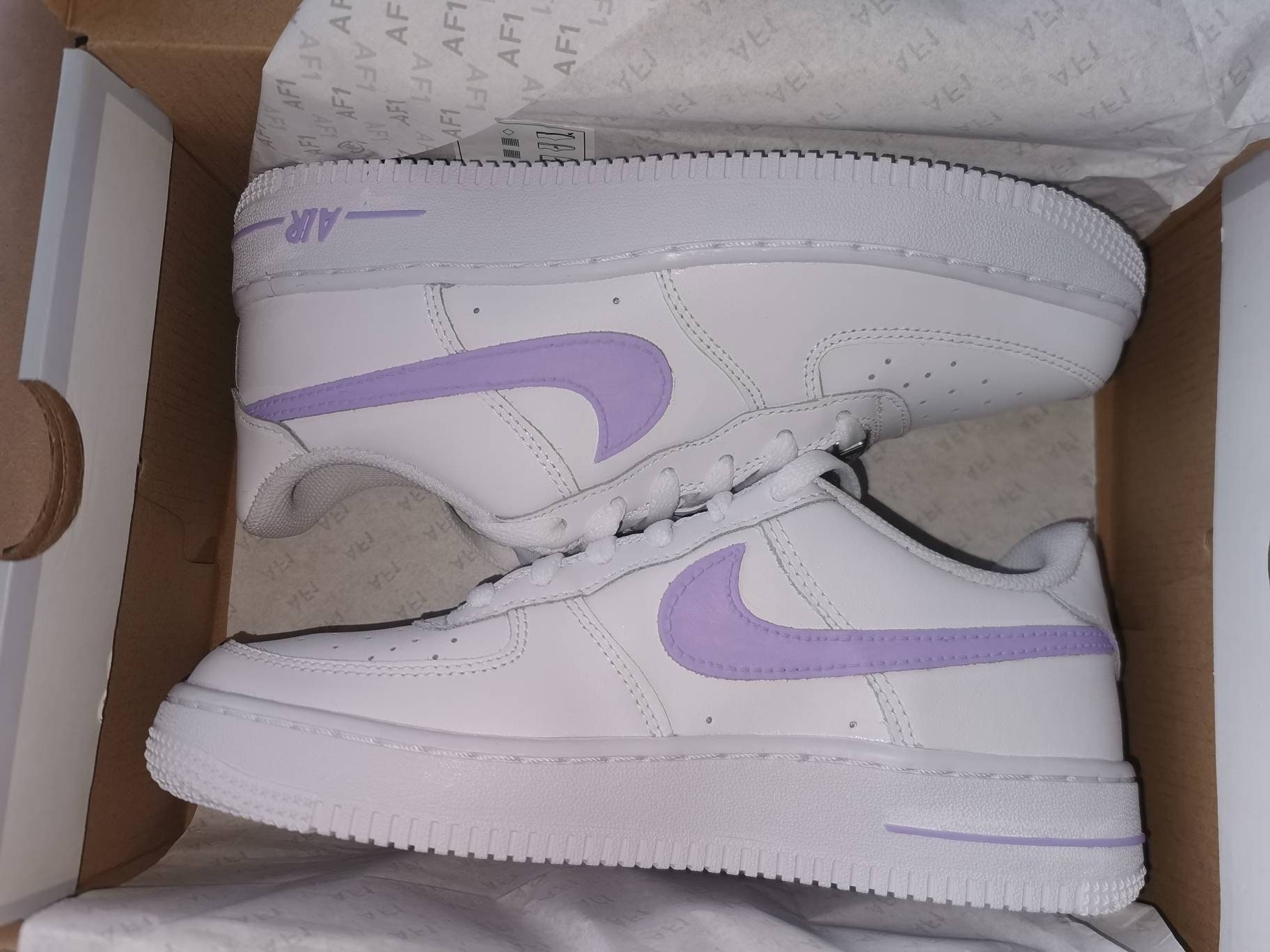 white air force with neon tick