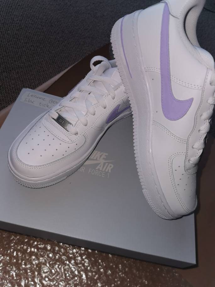 white air force with neon tick